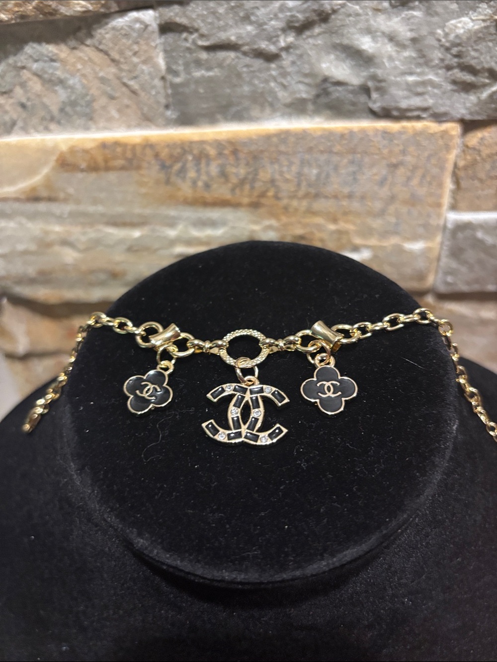 Gold-Plated Charm Bracelet with CC logo & Black Enamel Flower Accents